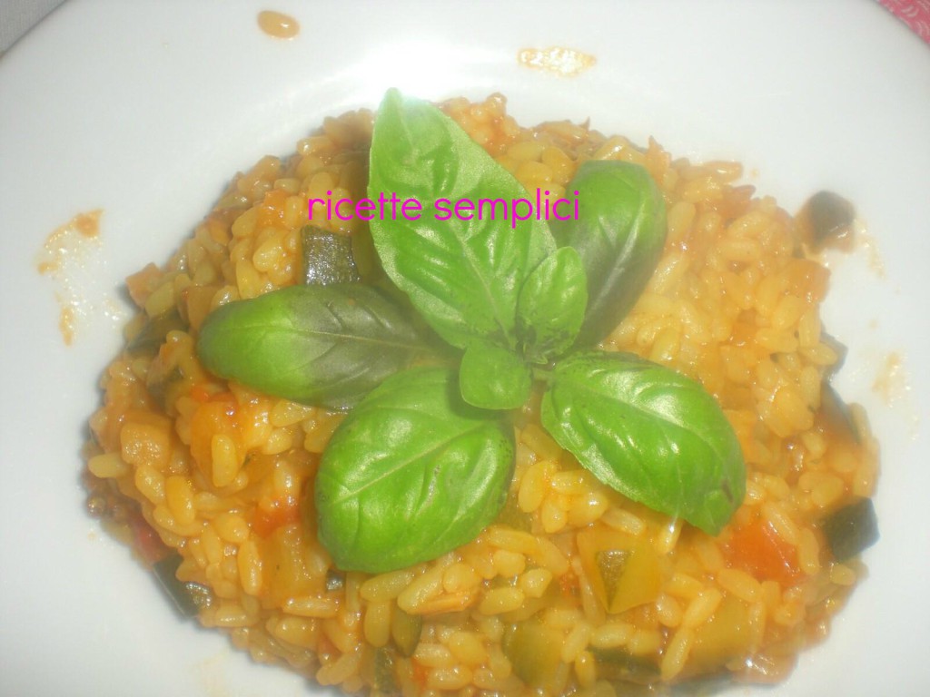 Risotto ai frutti di mare con zucchine e pomodori Ricette semplici